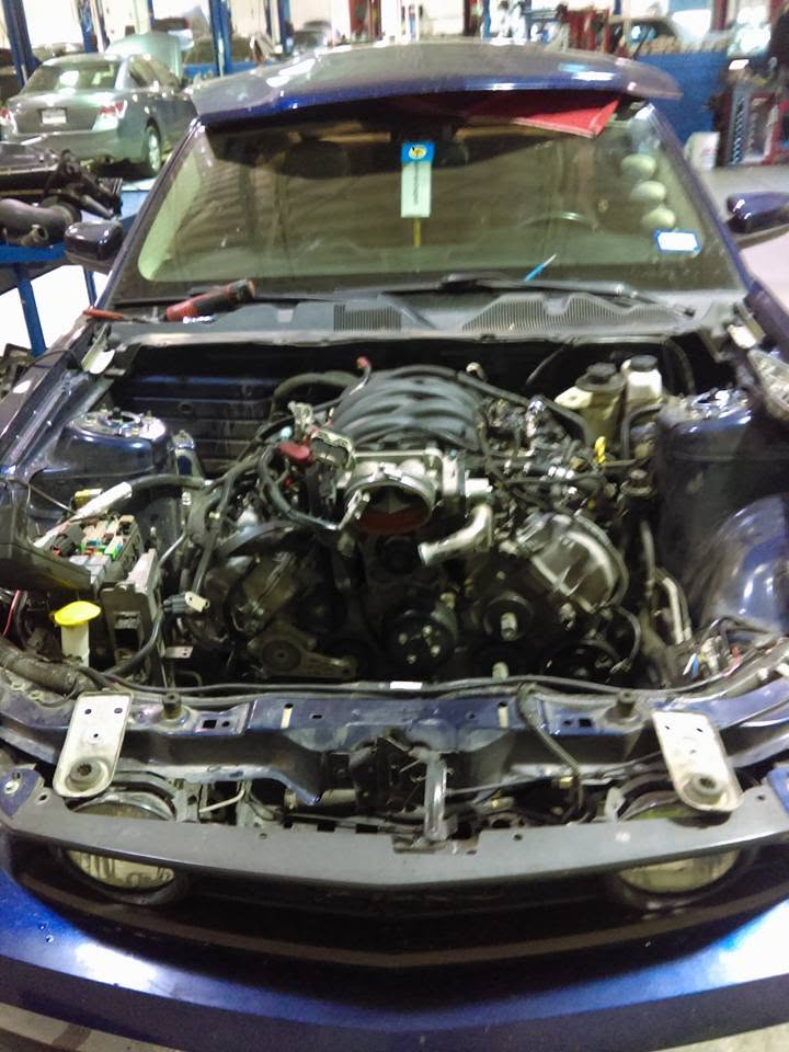 Open engine bay during a repair