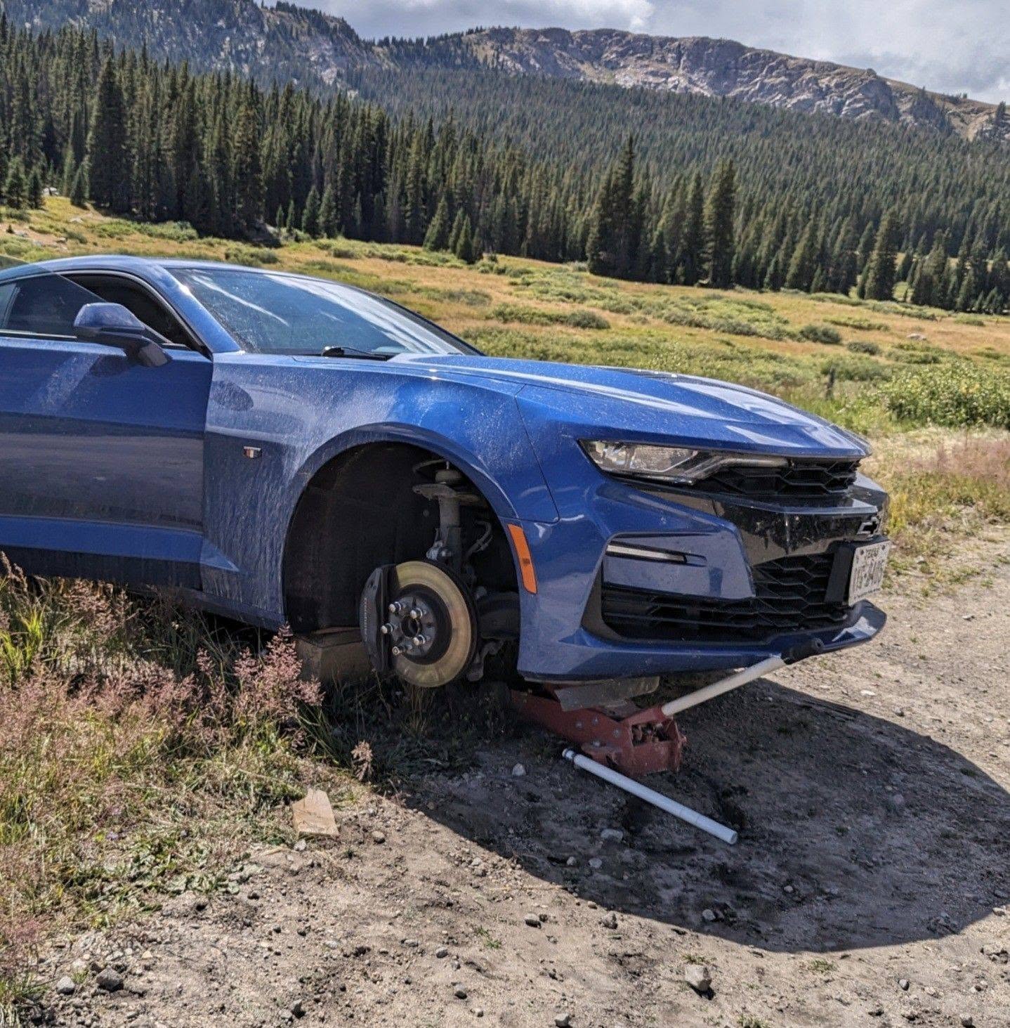 Vehicle being worked on outdoors
