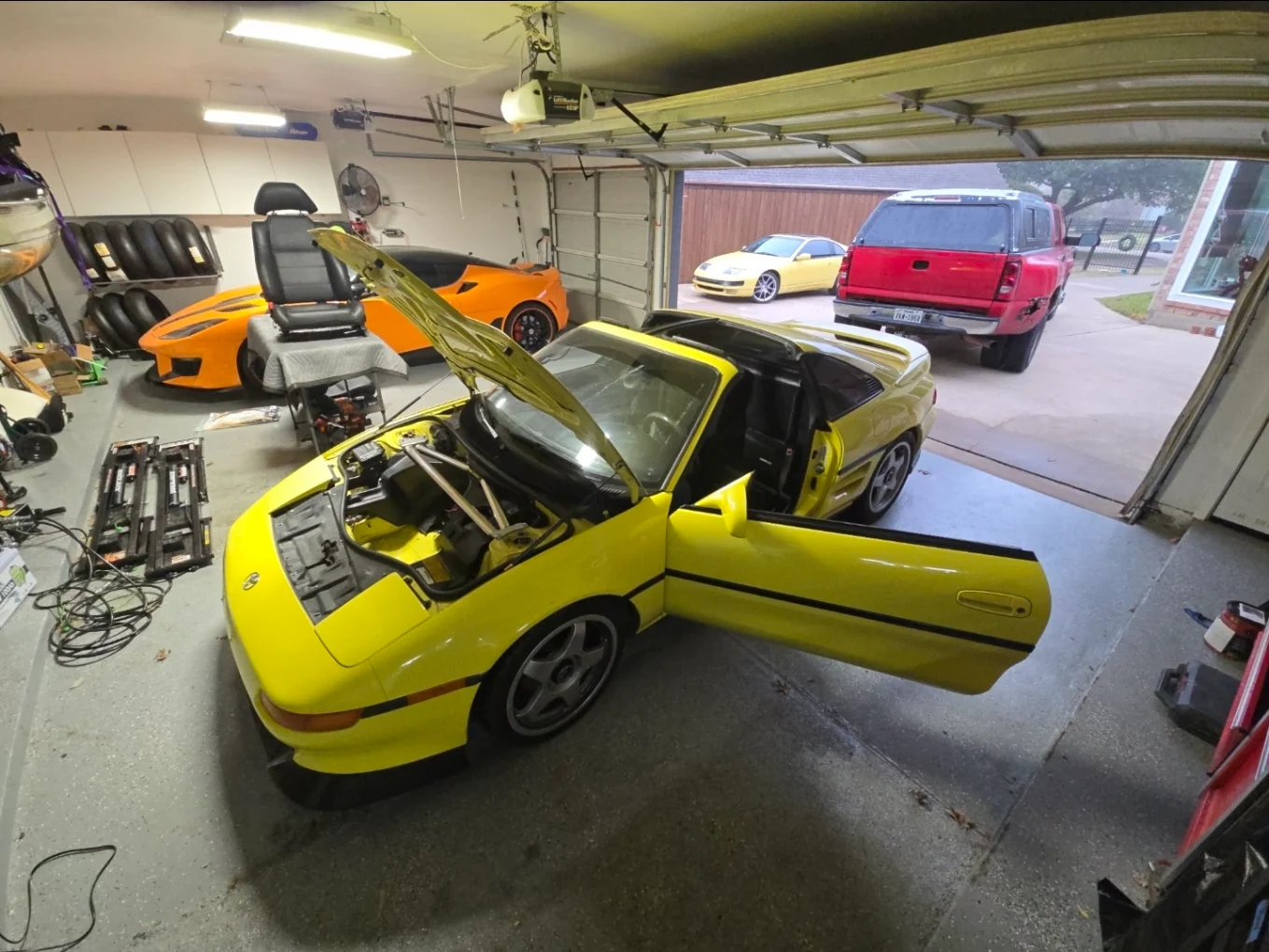 Vehicle work in a workshop with engine components nearby